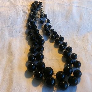 Double strand black plastic ball necklace